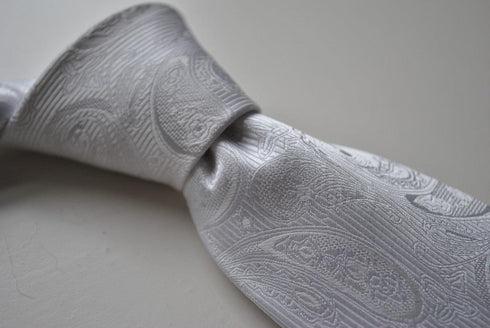 silver tie with paisley design